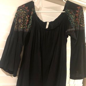 Cute top with amazing detail in shoulder area.